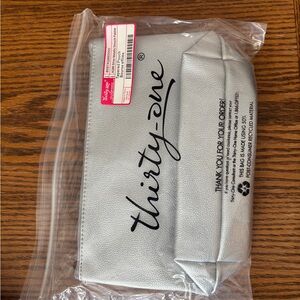 Thirty-One Silver tapered pouch